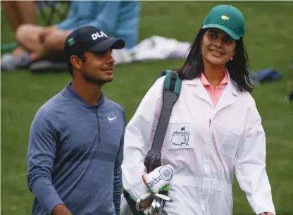  ?? AP ?? Shubhankar Sharma along with his sister and caddie Vandini at the Masters golf tournament in Augusta on Wednesday.