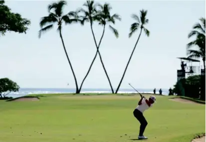  ?? ANDY LYONS/GETTY IMAGES ?? Hayden Buckley is indeed shooting for a W in Hawaii, as he leads by two after three rounds.