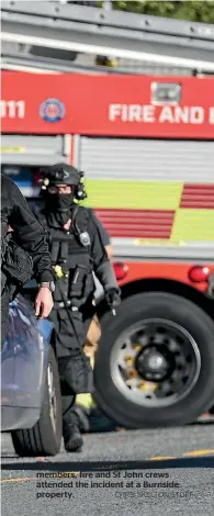  ?? CHRIS SKELTON/STUFF ?? Police armed offenders squad members, fire and St John crews attended the incident at a Burnside property.