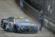  ?? ANDRE TEAGUE — THE BRISTOL HERALD-COURIER VIA AP ?? Jimmie Johnson celebrates his win at Bristol Motor Speedway on Monday