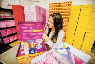  ?? CAROLINE YANG THE NEW YORK TIMES ?? Nicole Pomije, who is struggling to make payroll for her baking business, the Cookie Cups, with a baking kit aimed at children that she launched last year in Chanhassen, Minn.