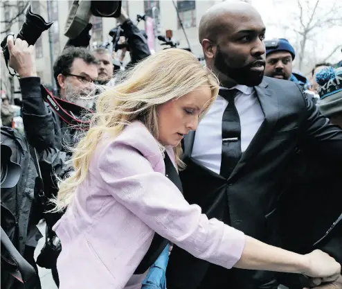 ?? SETH WENIG / THE ASSOCIATED PRESS ?? Porn actress Stormy Daniels arrives at Federal Court in New York on Monday to attend a hearing on whether materials the FBI seized from Michael Cohen, U.S. President Donald Trump’s personal lawyer, should be protected.