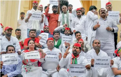  ?? PTI ?? Samajwadi Party workers stage a protest over the Deoria shelter home issue at GPO in Lucknow on Monday. —