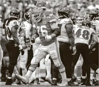  ?? David Eulitt / Getty Images ?? Laurent Duvernay-Tardif, playing the Ravens in 2019, won a Super Bowl with the Chiefs and within months he was working as a doctor at a long-term-care facility near his native Montreal.