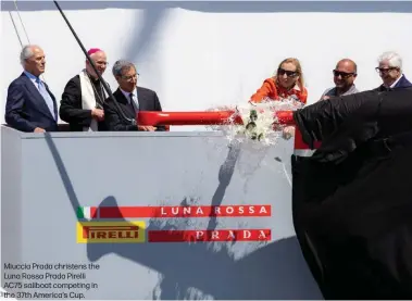  ?? ?? Miuccia Prada christens the Luna Rossa Prada Pirelli AC75 sailboat competing in the 37th America's Cup.