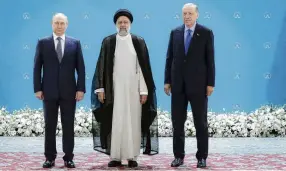  ?? PHOTO: VIA REUTERS ?? Central figures . . . Posing for a photo in Teheran before a meeting of leaders from the three guarantor states of the Astana process, designed to find a peace settlement in the Syria crisis, are (from left) Russian President Vladimir Putin, Iranian President Ebrahim Raisi and Turkish President Tayyip Erdogan, earlier this year.