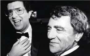  ??  ?? Great loss: A file photo showing Hamlisch (left) and theatrical producer Joseph Papp at the Broadway musical, ‘A Chorus Line’, in New York.