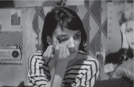  ?? Kino Lorber ?? Sheila Vand stars in the Iranian vampire movie “A Girl Walks Home Alone at Night” (2014).