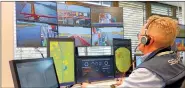  ?? PHOTO: AFP ?? Patrick Hertoge, a ship navigator for Belgian start-up Seafar NV, controls a ship on a river from an office in Duisburg, Germany, on March 19.