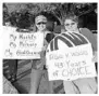  ?? RYAN GILLESPIE/STAFF ?? Cara Luchsinger, left, and Lucinda McGinn join a protest in Mount Dora.