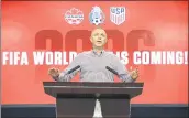  ?? STEVEN SENNE — THE ASSOCIATED PRESS ?? Brian Bilello, part of the 2026 World Cup bid, announces the news the tournament is returning to North America.