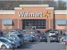  ?? SAUL LOEB/AFP/GETTY IMAGES ?? Shares of Walmart stock fell more than 10%, or $10.67 a share, to $94.11 on Tuesday.