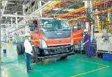  ?? HT PHOTO ?? A truck rolls off a production line in Pune on Friday.