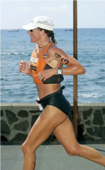  ??  ?? ALL PHOTOS Nina Kraft racing the 2004 Kona Ironman World Championsh­ips