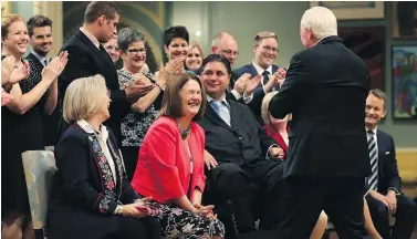  ?? LARS HAGBERG / AFP / GETTY IMAGES ?? Prime Minister Justin Trudeau dissolved the department of Indigenous And Northern Affairs Canada and replaced it with two new ministries, naming Jane Philpott, centre, the minister of the Department of Indigenous Services.