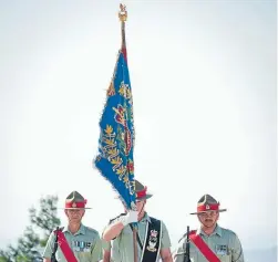  ?? Photo: NZDF ?? Soldiers march the 5th Battalion battle flag into the Battle for Chunuk Bair centenary service at Gallipoli.