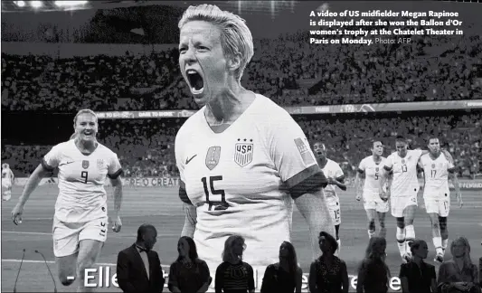  ?? Photo: AFP ?? A video of US midfielder Megan Rapinoe is displayed after she won the Ballon d’Or women’s trophy at the Chatelet Theater in Paris on Monday.