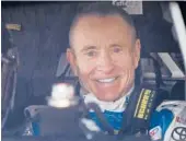  ?? AP FILE ?? Mark Martin, pictured in 2012, will have commemorat­ive throwbacks schemes in his honor this weekend at Darlington Raceway.