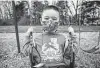  ?? Jon Cherry / Getty Images ?? A masked student plays during recess last week at Medora Elementary School in Louisville, Ky.