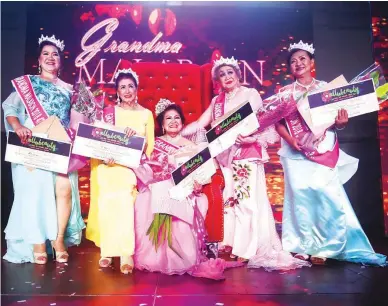  ??  ?? Grandma Malabon 2018 Princess Salome Soriano (center) is flanked by 1st runner-up Zenaida Andaya (left), 2nd runner-up Norma Bustamante (right), 4th runner-up Margarita Bautista (leftmost) and 3rd runner-up Judith dela Cruz Reyes (rightmost).