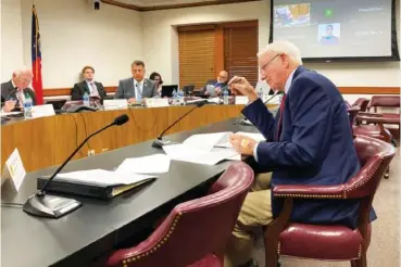  ?? AP PHOTO BY JEFF AMY ?? Georgia Senate Ethics Committee Chairman Max Burns, R-Sylvania, speaking Monday at the state Capitol in Atlanta, explains a bill that would ban private contributi­ons to counties for elections.