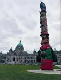  ?? PHOTO BY JOLYNN PARENTEAU ?? T h e Knowledge Totem has stood watch over the Inner Harbour on the Parliament grounds since 1990. The loon, fisherman, bone game player and frog represent lessons of the past and hope for the future.