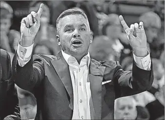  ?? [BARBARA J. PERENIC/DISPATCH] ?? New coach Chris Holtmann and the Buckeyes will open the season with two games in three days. Where: TV: Radio: Records:
Notable: