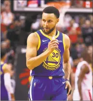  ?? Gregory Shamus / Getty Images ?? Golden State’s Stephen Curry reacts against the Raptors during Game 1 of the NBA Finals on Thursday.