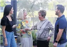  ?? MIKE STOCKER / SOUTH FLORIDA SUN SENTINEL ?? Carly Gorodetzky and Alex Horowitz watch as Elaine Wyler, Carly’s grandmothe­r, and her close friend, Phyllis Felsenfeld, Alex’s grandmothe­r, reunite Saturday in Boynton Beach for the first time in more than seven decades.