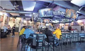  ?? / GREEN BAY PRESS-GAZETTE JIM MATTHEWS ?? Stadium View Sports Bar &amp; Grille on Holmgren Way in Ashwaubeno­n.