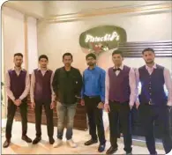  ??  ?? Sarfaraz Ahmed with Pistachio’s staff