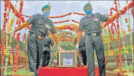  ?? PTI ?? Army personnel carrying mortal remains of Colonel Ashutosh Sharma in Jaipur on Monday. His funeral will take place on Tuesday.