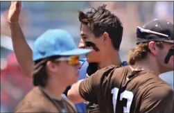  ?? KYLE FRANKO/ TRENTONIAN PHOTO ?? Mercer County catcher Carl Birge is greeted by teammates after he threw out a base stealer to end the second inning against SEPA during a Carpenter Cup baseball game on Wednesday at the Phillies UYA Showcase Field at FDR Park in Philadelph­ia.