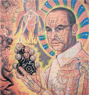  ??  ?? A portrait of late Swiss chemist Albert Hofmann on a collection of LSD blotting papers shown during an exhibition entitled ‘LSD, The 75 Years Of A Problem Child’, at the Swiss National Library in Bern.