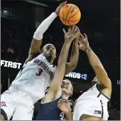  ?? TED S. WARREN — THE ASSOCIATED PRESS ?? San Diego State guard Micah Parrish, left, and the No. 5-seeded Aztecs will take on top seed Uconn today.