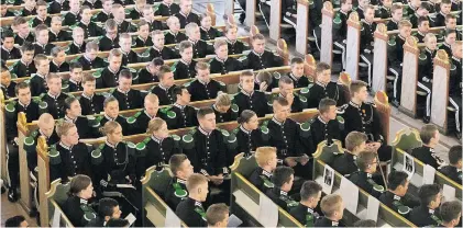  ?? Picture: EPA ?? Guardsmen attend His Majesty The King’s Guard church parade in the Oslo Cathedral, in Oslo, Norway, on Tuesday. Norway’s King Harald and Crown Prince Haakon, both unseen, also took part.
