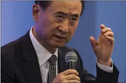  ?? BLOOMBERG ?? Wang Jianlin, chairman and president of Dalian Wanda Group Co, speaks during the Hong Kong Asian Financial Forum.