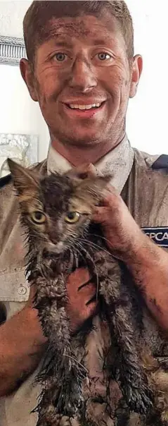  ??  ?? Bedraggled: Lola and RSPCA rescuer Matt Brown