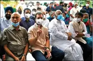  ??  ?? Congress leader Rahul Gandhi along with other leaders of Opposition take part in a farmers’ protest against farm laws at Jantar Mantar, in New Delhi on Friday. ANI