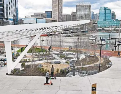  ?? KENNETH K. LAM/BALTIMORE SUN ?? After Rash Field, shown Saturday, was turned into a skate park and playground, Baltimore residents hope the new ownership of Harborplac­e will redevelop its two pavilions to extend the revival of the Inner Harbor.