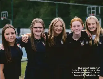  ?? ?? Students at Greenwich Catholic School share smiles outside during recess. Photo:
Greenwich Catholic School