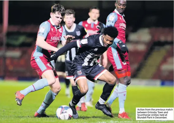  ??  ?? Action from the previous match between Grimsby Town and Scunthorpe United, held at Blundell Park in December.