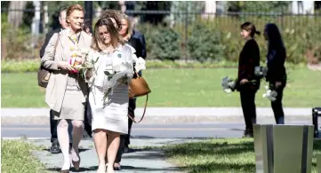  ??  ?? Canadian Foreign Minister Chrystia Freeland leads other female Foreign Ministers to commemorat­e the victims of gender and sexual-based violence by rememberin­g the Ecole Polytechni­que massacre in Montreal, Canada. — AFP photo