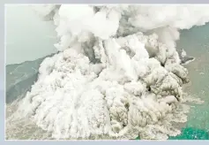  ?? — Reuters photo ?? A plume of ash rises as Anak Krakatau erupts.