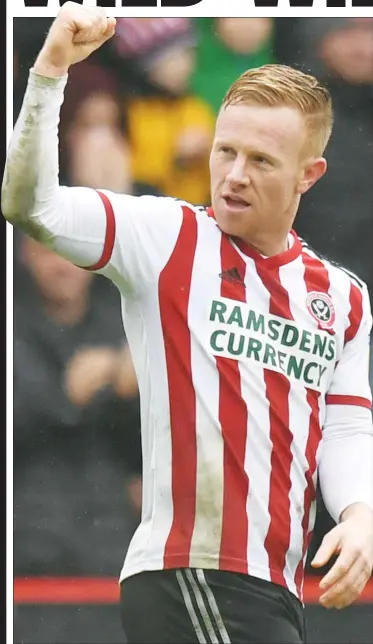  ??  ?? CLINCHER: Sheffield United’s Mark Duffy celebrates scoring the Blades’ second