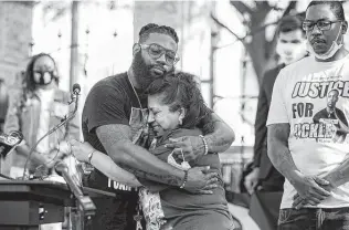  ?? Jay Janner / Associated Press ?? Elizabeth Gonzales is consoled by Cluren Williams at a rally for the George Floyd Act at the Texas Capitol on Thursday. The hearing was just the first step in a long road to approve the bill.