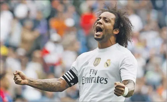  ?? DANI DUCH ?? El lateral del Real Madrid Marcelo celebra con efusividad el primer gol del encuentro