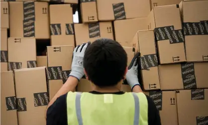  ??  ?? The Shop, Distributi­ve and Allied Employees Associatio­n has joined forces with the Transport Workers Union to organise workers on Amazon sites in Australia. Photograph: Bloomberg/Bloomberg via Getty Images