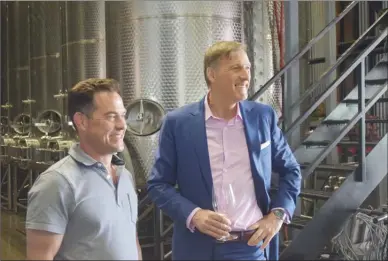  ?? MELANIE EKSAL/The Okanagan Weekend ?? Time winemaker Graham Pierce, left, joins People’s Party of Canada Leader Maxime Bernier at an event at the Penticton winery on Friday. Bernier, a Quebec MP, will attend a fundraisin­g dinner tonight in Kelowna and a rally in Kelowna on Sunday.