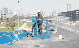  ??  ?? A worker at the constructi­on site of the Vietnam Grand Prix in Hanoi.